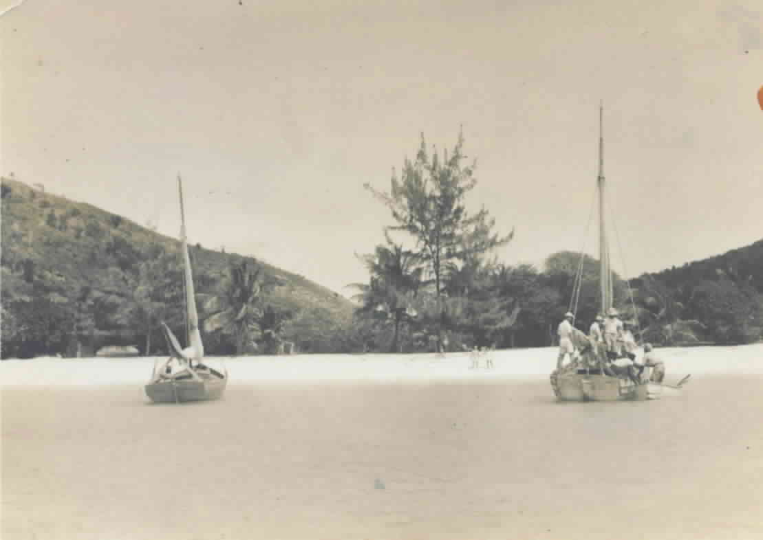 Local men transporting supplies up the hill.